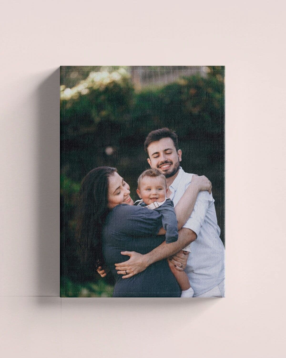 Kanvas me foto familjare në mur